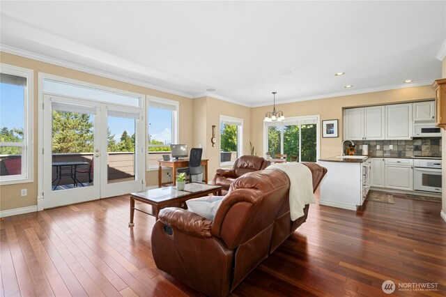 12232 SE 80th Way, Newcastle, WA 98056 - living area with a chandelier, dark wood-type flooring, baseboards, french doors, and recessed lighting