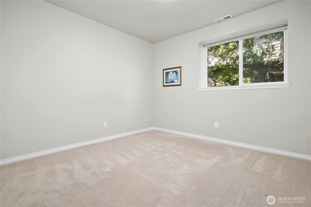 12232 SE 80th Way, Newcastle, WA 98056 - spare room with baseboards and light carpet