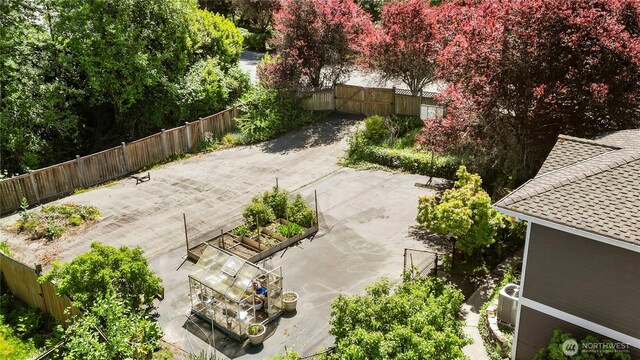 12232 SE 80th Way, Newcastle, WA 98056 - fenced backyard featuring a patio area