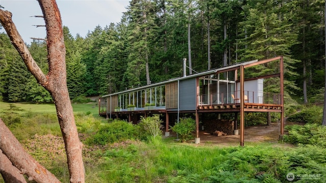 271 Blanc Rd, Orcas Island, WA 98245 - rear view of property featuring a wooden deck and a forest view