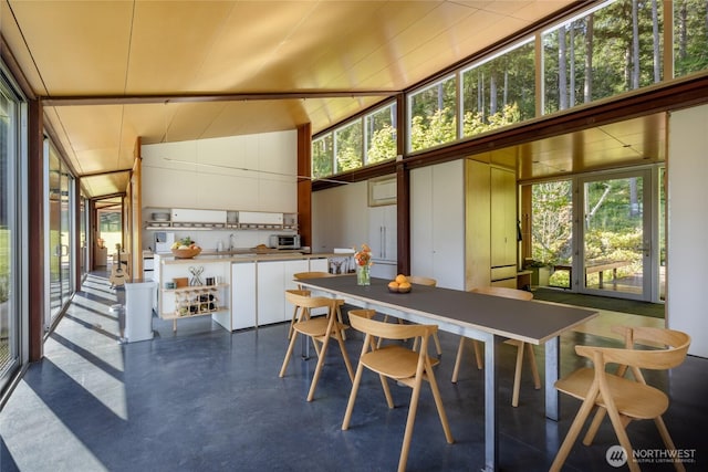 271 Blanc Rd, Orcas Island, WA 98245 - sunroom featuring a sink and vaulted ceiling