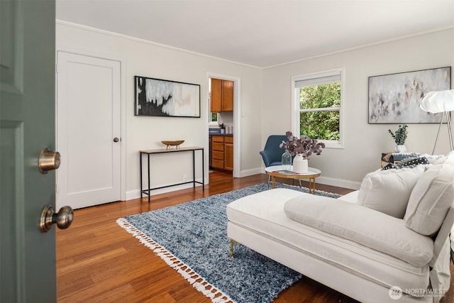 9713 33rd Ave SW, Seattle, WA 98126 - living area featuring wood finished floors, ornamental molding, and baseboards