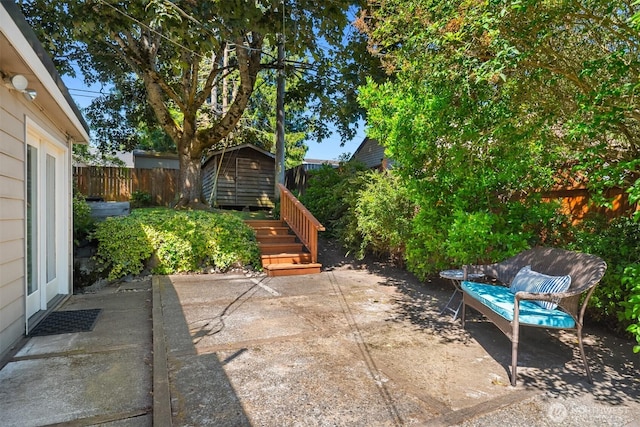9713 33rd Ave SW, Seattle, WA 98126 - fenced backyard featuring a patio area
