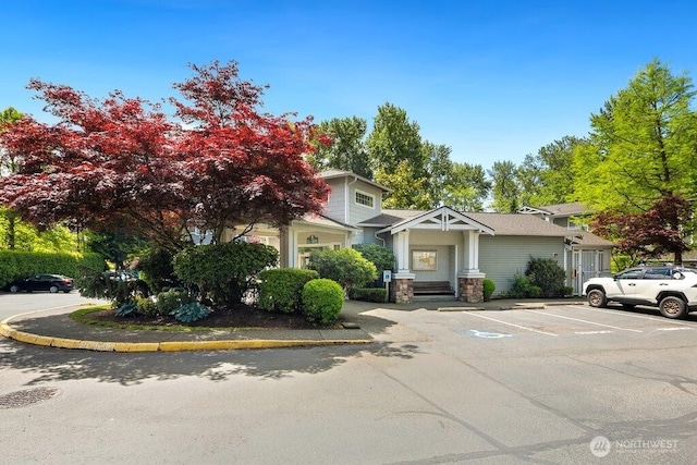 12712 Admiralty Way Unit G102, Everett, WA 98204 - view of front of home featuring uncovered parking