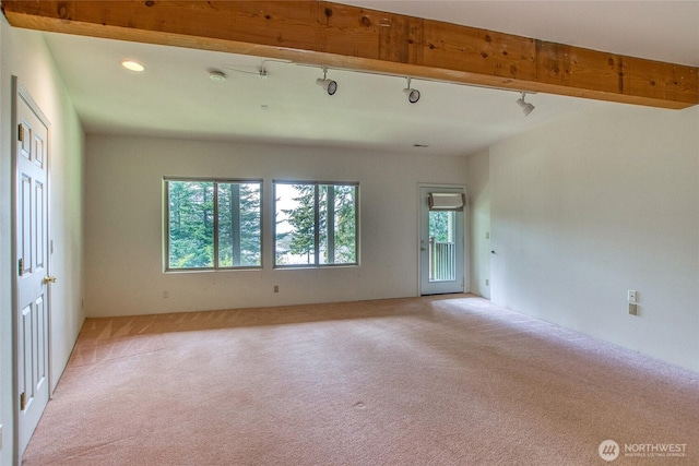121 Switchback Rd, Orcas Island, WA 98245 - spare room featuring light carpet, rail lighting, recessed lighting, and a smoke detector