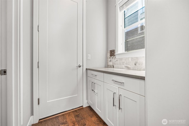 21888 SE 5th Pl, Sammamish, WA 98074 - bathroom with vanity, decorative backsplash, and wood finished floors