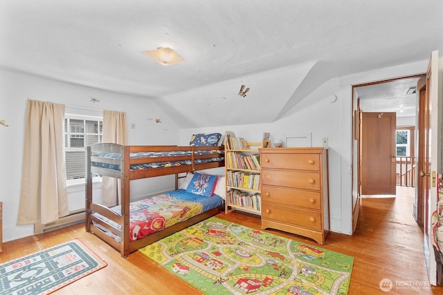 1228 22nd Ave, Longview, WA 98632 - bedroom featuring wood finished floors and lofted ceiling
