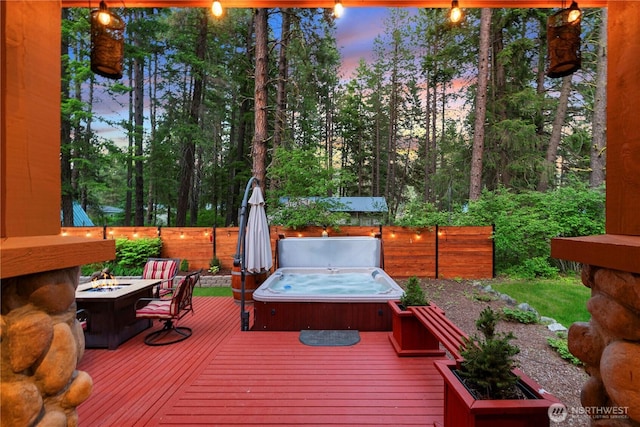 18880 Pine Loop, Leavenworth, WA 98826 - deck at dusk with a covered hot tub and a fire pit