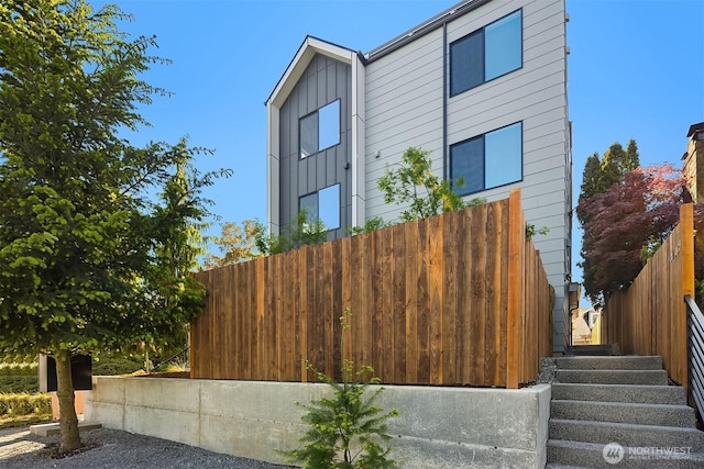 8513 19th Ave NW Unit A, Seattle, WA 98117 - view of property exterior featuring board and batten siding