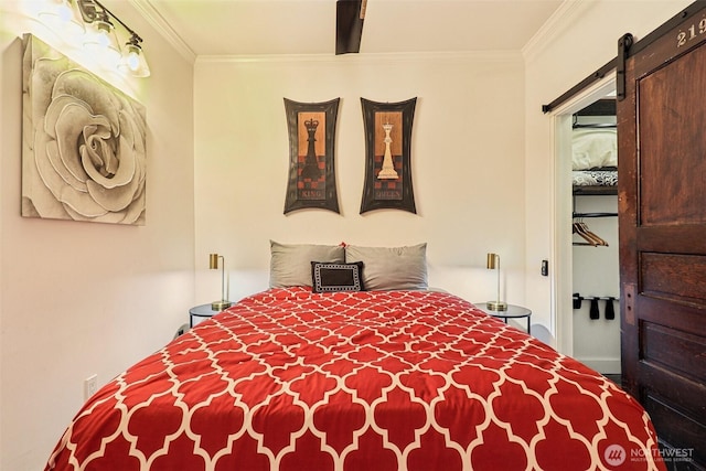 2415 2nd Ave Unit 543, Seattle, WA 98121 - bedroom with a barn door and ornamental molding