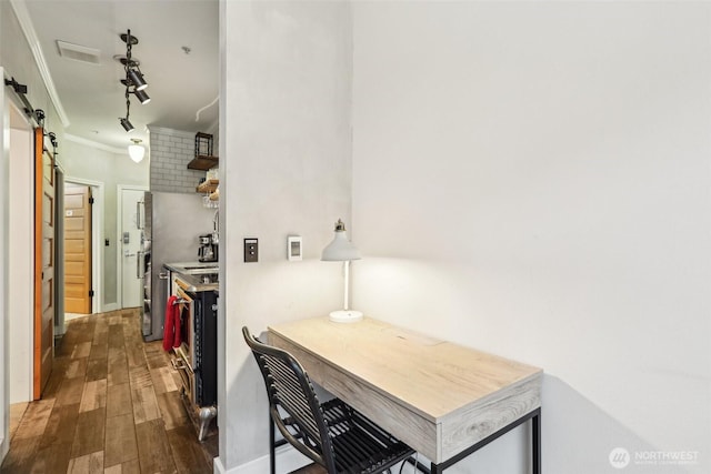 2415 2nd Ave Unit 543, Seattle, WA 98121 - hallway with a barn door, wood finished floors, and ornamental molding