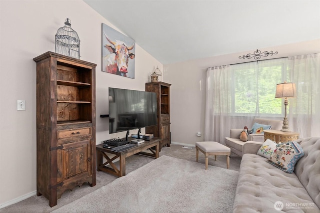 4628 109th Ave SE, Snohomish, WA 98290 - living area featuring light carpet, vaulted ceiling, and baseboards