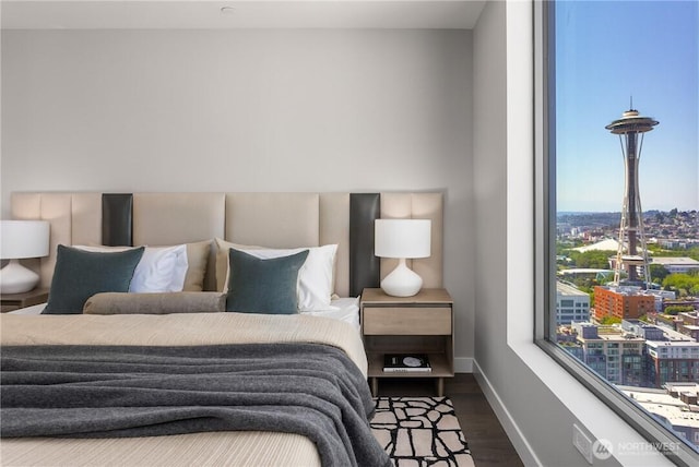 2510 6th Ave Unit 2802, Seattle, WA 98121 - bedroom featuring wood finished floors and baseboards