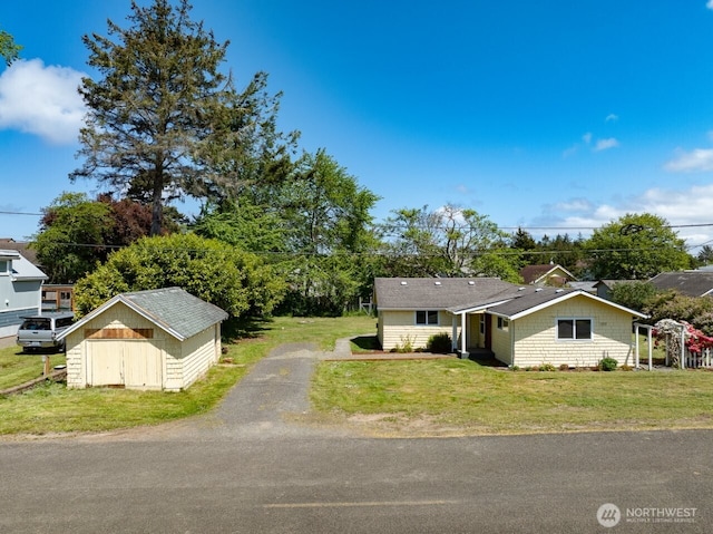 1707 258th Pl, Ocean Park, WA 98640 - single story home with a front yard and driveway