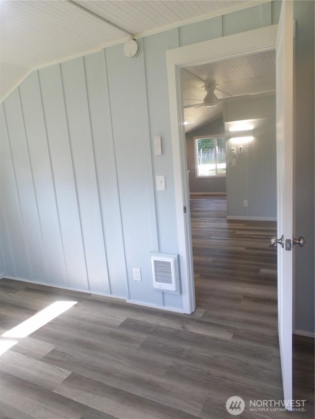1707 258th Pl, Ocean Park, WA 98640 - unfurnished room with wood finished floors, ceiling fan, baseboards, a smoke detector, and heating unit