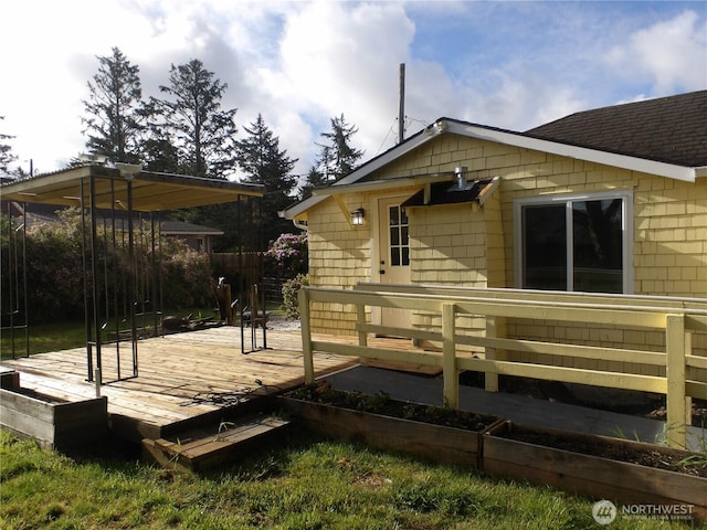 1707 258th Pl, Ocean Park, WA 98640 - back of house featuring a deck and a shingled roof