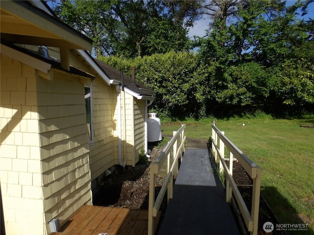 1707 258th Pl, Ocean Park, WA 98640 - view of side of home featuring a lawn