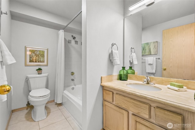 12056 15th Ave NE Unit 204, Seattle, WA 98125 - full bath featuring tile patterned flooring, toilet, vanity, shower / bath combo with shower curtain, and baseboards