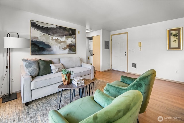 12056 15th Ave NE Unit 204, Seattle, WA 98125 - living area featuring wood finished floors and baseboards