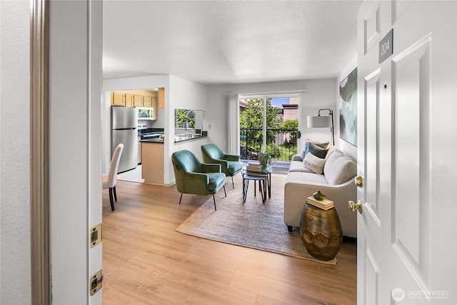 12056 15th Ave NE Unit 204, Seattle, WA 98125 - living room with light wood-style floors
