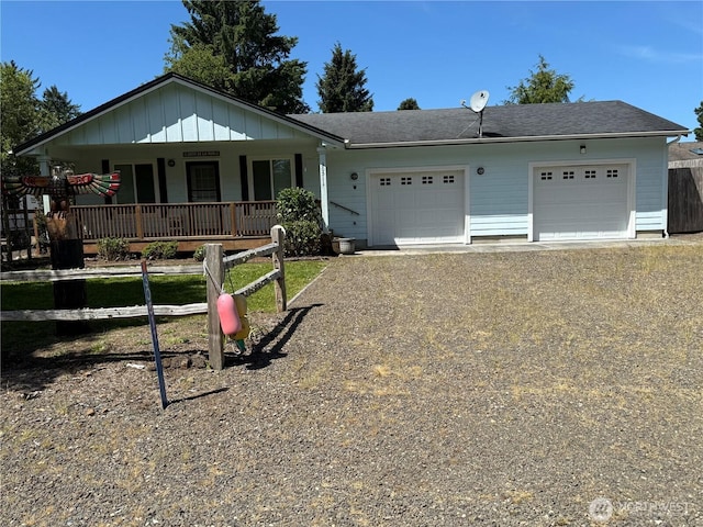 30511 M Pl, Ocean Park, WA 98640 - single story home with a porch, an attached garage, driveway, and a shingled roof