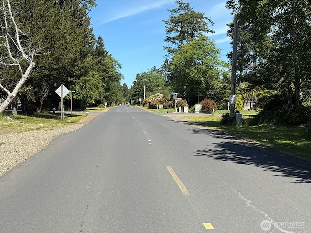 30511 M Pl, Ocean Park, WA 98640 - view of asphalt street with traffic signs and view of scattered trees