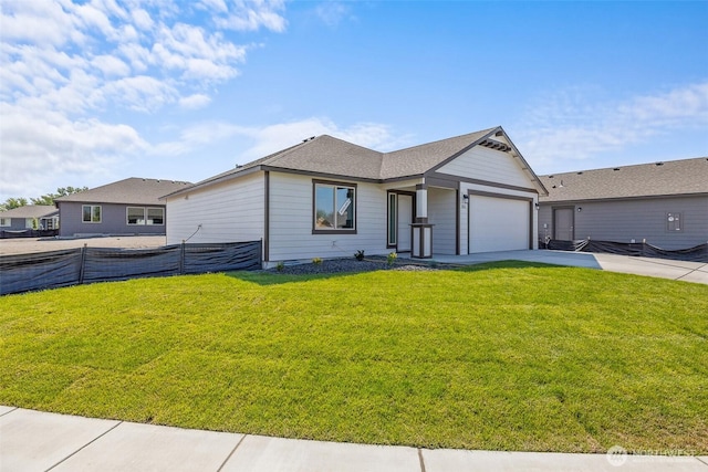 311 W Sandy Loop, Moses Lake, WA 98837 - ranch-style home featuring a garage and driveway