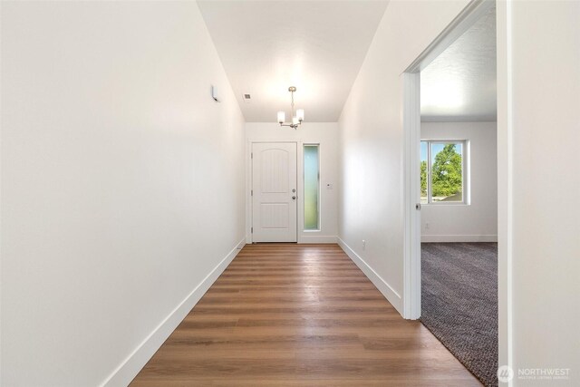 311 W Sandy Loop, Moses Lake, WA 98837 - foyer entrance with a chandelier and wood finished floors