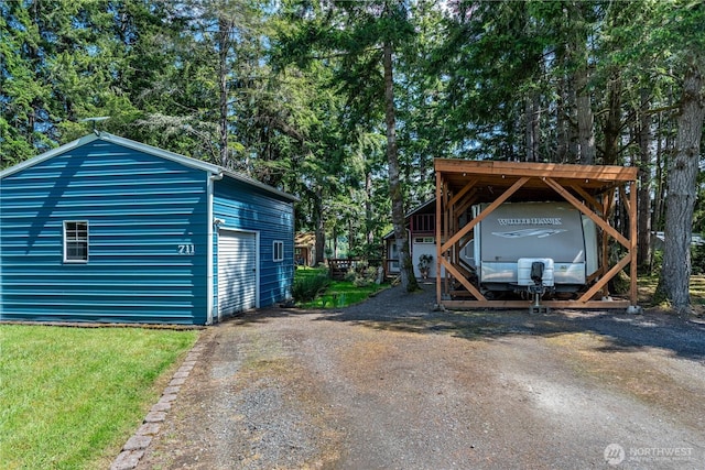 711 E Herron Blvd NW, Lakebay, WA 98349 - view of vehicle parking with a garage