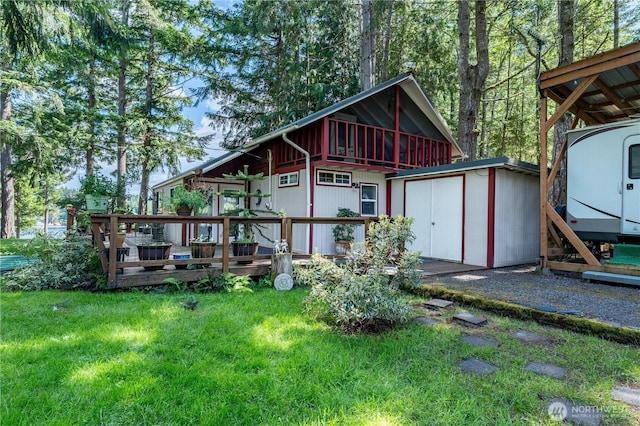 711 E Herron Blvd NW, Lakebay, WA 98349 - back of house with a lawn and a deck