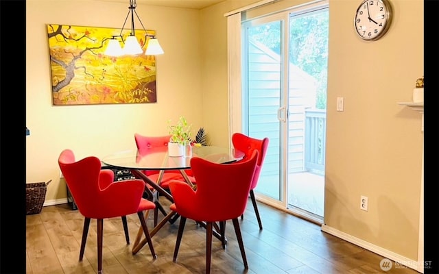 1009 112th St Unit D304, Everett, WA 98208 - dining space with wood finished floors and baseboards