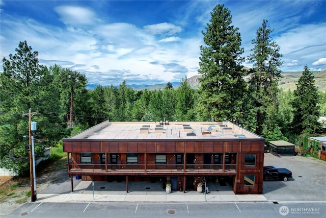 140 Twisp Ave W Unit 204, Twisp, WA 98856 - view of front of home with a forest view and a mountain view