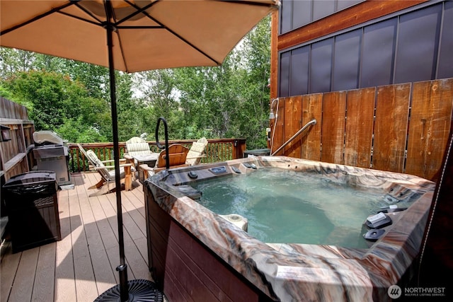 140 Twisp Ave W Unit 204, Twisp, WA 98856 - deck featuring a hot tub and area for grilling