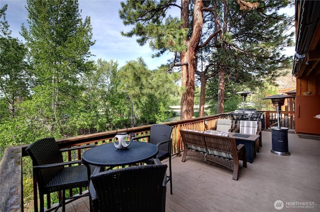 140 Twisp Ave W Unit 204, Twisp, WA 98856 - wooden terrace featuring outdoor dining area