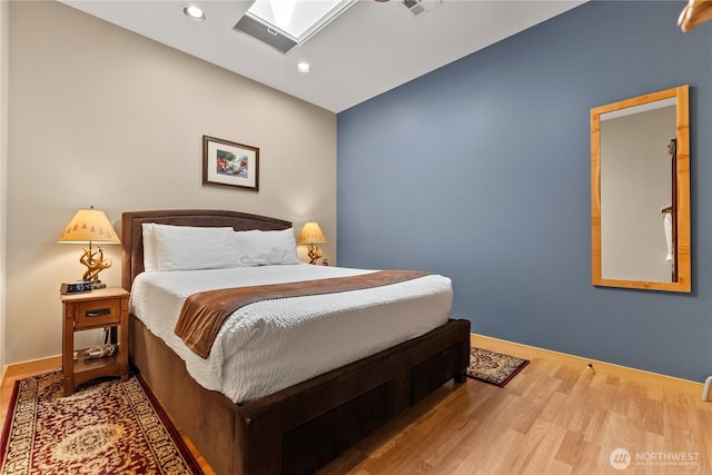 140 Twisp Ave W Unit 204, Twisp, WA 98856 - bedroom featuring wood finished floors, recessed lighting, and baseboards