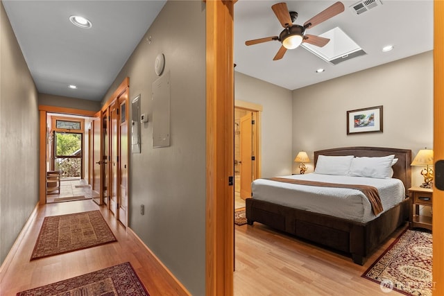 140 Twisp Ave W Unit 204, Twisp, WA 98856 - bedroom with light wood finished floors, baseboards, a skylight, recessed lighting, and ceiling fan