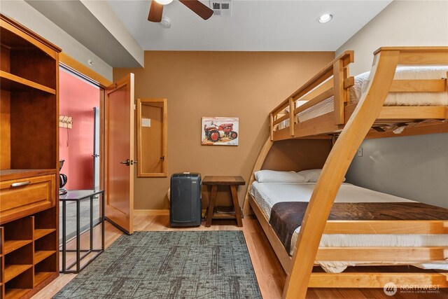 140 Twisp Ave W Unit 204, Twisp, WA 98856 - bedroom with wood finished floors, recessed lighting, a ceiling fan, and baseboards
