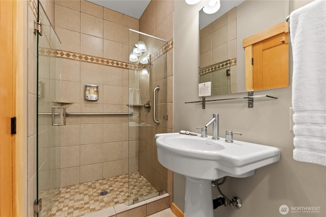 140 Twisp Ave W Unit 204, Twisp, WA 98856 - full bathroom featuring a stall shower and a sink