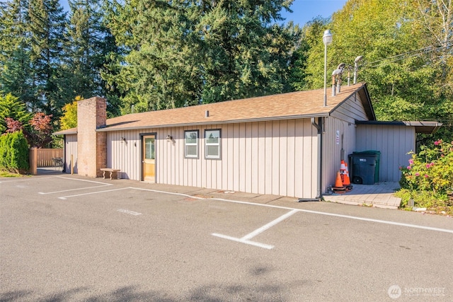 23708 Locust Way Unit 26B, Bothell, WA 98021 - ranch-style home with uncovered parking, a chimney, and a shingled roof