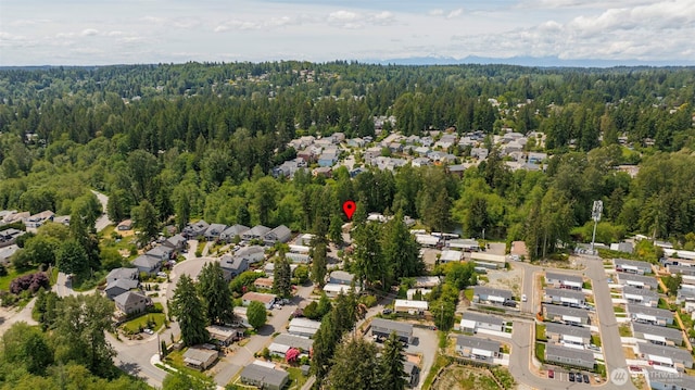 23708 Locust Way Unit 26B, Bothell, WA 98021 - aerial overview of property's location featuring a heavily wooded area and nearby suburban area