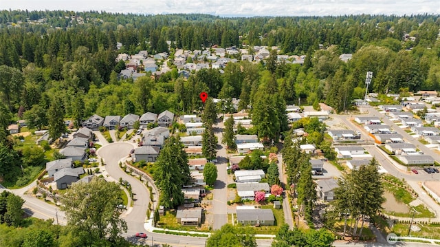 23708 Locust Way Unit 26B, Bothell, WA 98021 - aerial view of property's location with nearby suburban area and a heavily wooded area