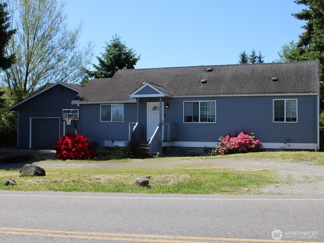 9020 Corbin Dr, Everett, WA 98204 - ranch-style house featuring a front yard, roof with shingles, driveway, and a garage