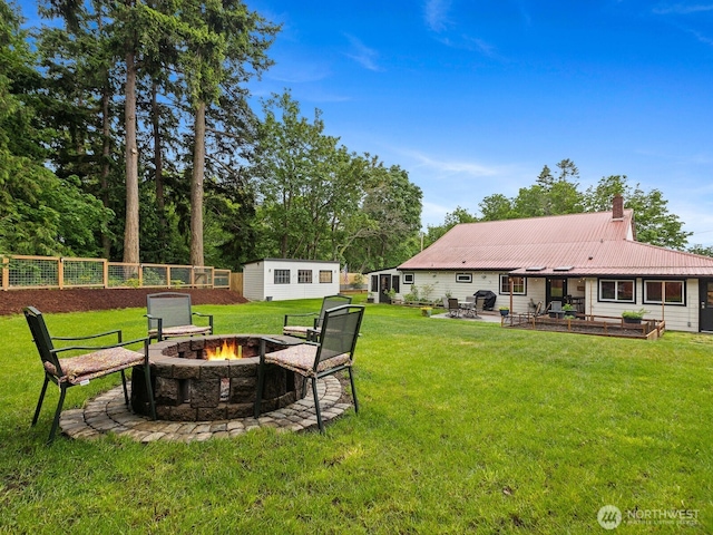 957 SW Camano Dr, Camano Island, WA 98282 - view of yard with an outdoor fire pit, a patio, and an outdoor structure
