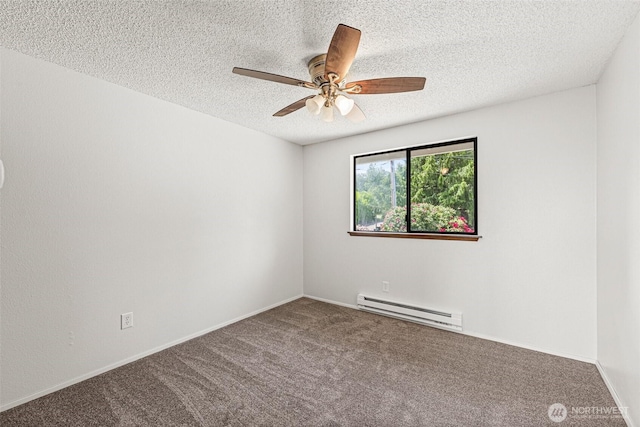 7391 E Grandview St, Port Orchard, WA 98366 - spare room featuring a baseboard heating unit, carpet, a textured ceiling, and a ceiling fan