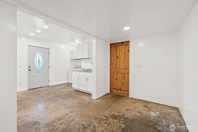 7391 E Grandview St, Port Orchard, WA 98366 - entrance foyer with washer / dryer, concrete floors, and recessed lighting