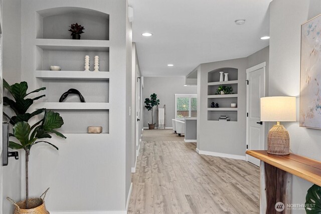 31632 19th Dr NW, Stanwood, WA 98292 - hall featuring wood finished floors, recessed lighting, built in features, and baseboards