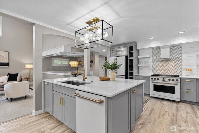 31632 19th Dr NW, Stanwood, WA 98292 - kitchen with white appliances, gray cabinets, a sink, a chandelier, and ornamental molding