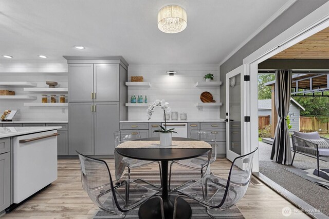 31632 19th Dr NW, Stanwood, WA 98292 - dining space featuring ornamental molding, light wood-style floors, a chandelier, and recessed lighting