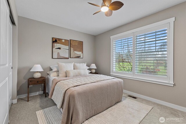 31632 19th Dr NW, Stanwood, WA 98292 - carpeted bedroom with baseboards, ceiling fan, and a closet