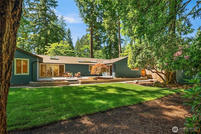 2714 162nd Ave NE, Bellevue, WA 98008 - rear view of house featuring a patio area and a lawn